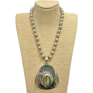Etched Cowboy Hat Pendant on Faux Navajo Pearl Necklace